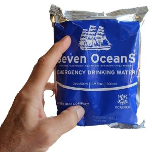 GC Rieber Compact seven oceans emergency drinking water in hand 500ml