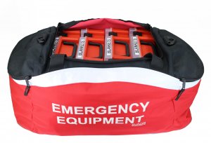 red emergency equipment holdall with boxes of blankets