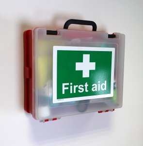 cheap first aid box hanging on wall with bracket