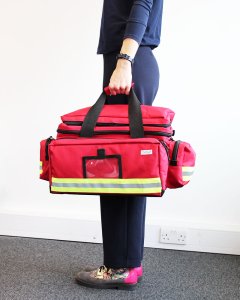 red medical bag carried by handles